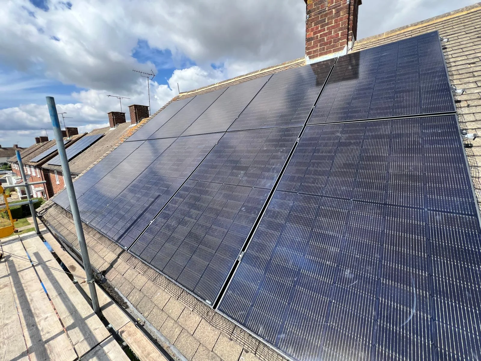 Solar panels in a sunlit Essex field